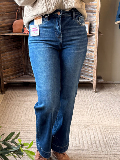 Risen tummy control straight jeans in dark blue wash, front view with back pockets