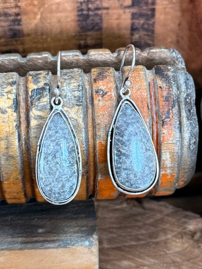 Blue textured teardrop stone fishhook earrings in silver-tone, side view