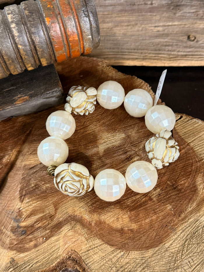 Pearl rose stretch bracelet with white opal beads and two gold rose flower charms