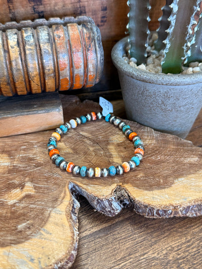 Beaded turquoise and spiny oyster bracelet with orange accents and white shell pearls