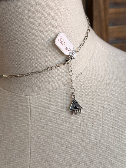 Silver-tone necklace with small boot pendant on a linked chain