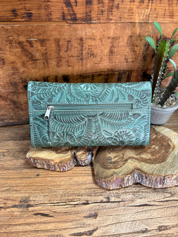 Turquoise leather wallet with zipper, embossed floral pattern, and stitched trim