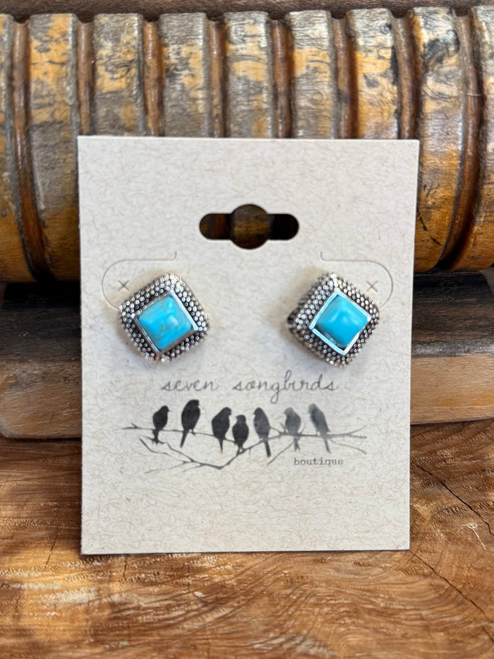 Silver-tone square stud earrings with bright turquoise stone, wire mesh setting