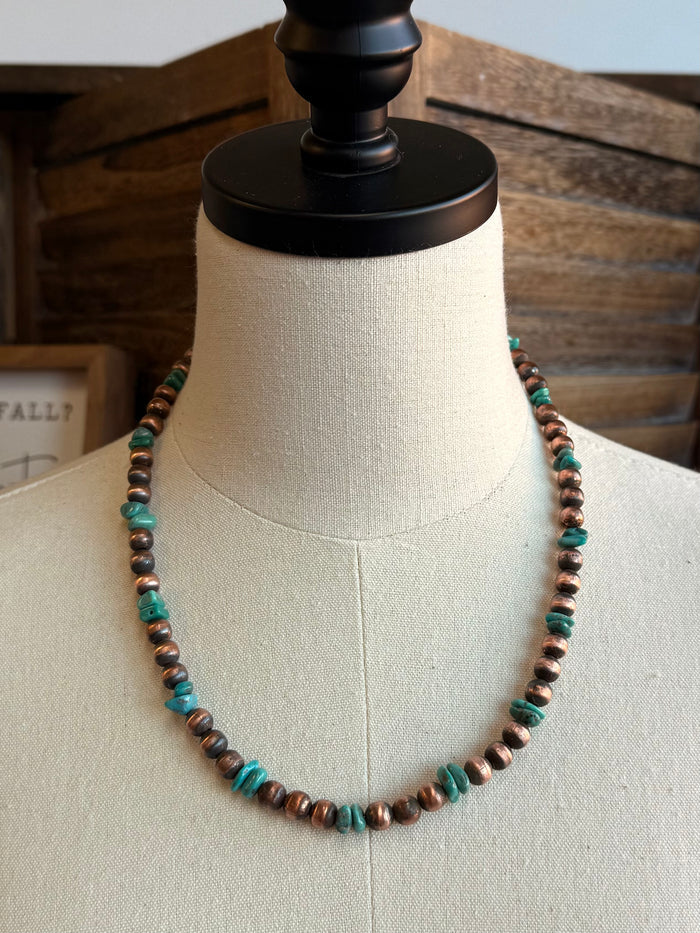 Copper and turquoise beaded necklace with uniform round bead strand