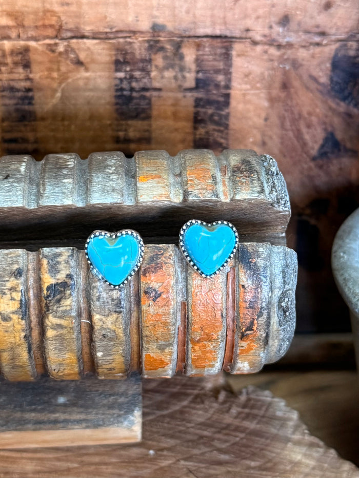 Pair of turquoise heart stud earrings in silver-tone settings