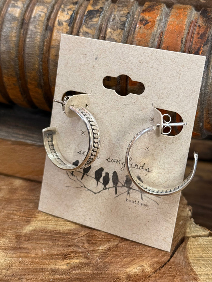 Sterling silver hoop stud earrings, large curved hoops with raised detail and clasp backs