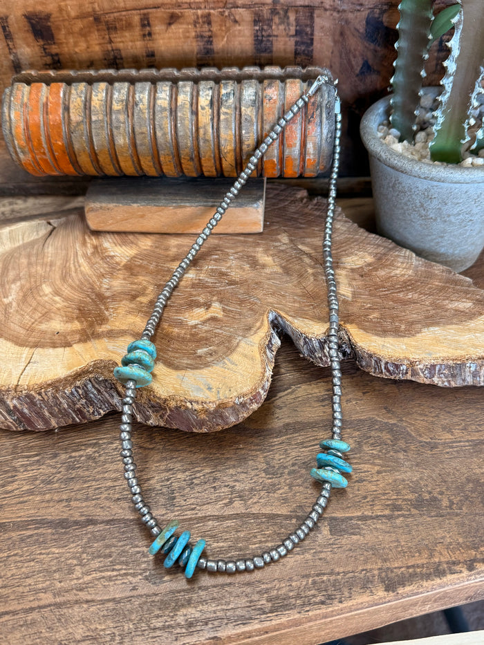 Turquoise chunk-bead necklace on silver-tone beaded chain with turquoise accent pieces