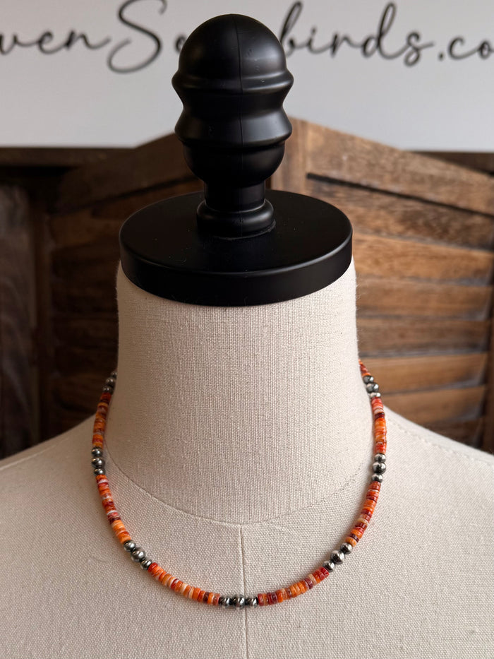 16-inch orange spiny oyster heishi necklace with silver-toned bead trim