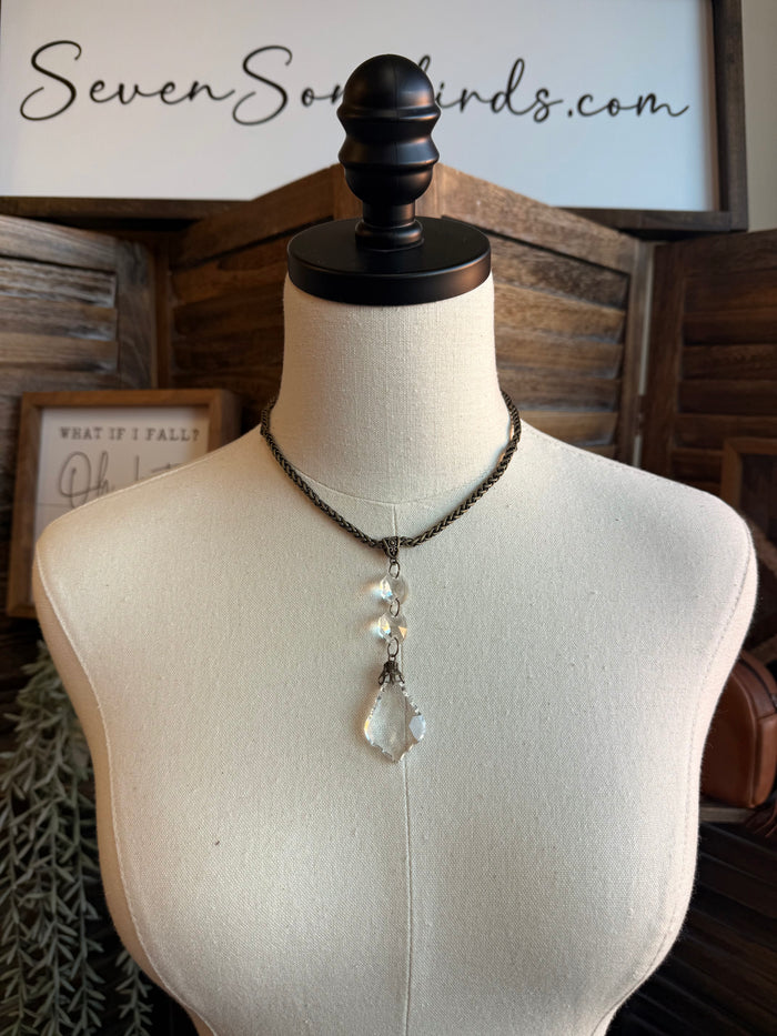 Silver-tone chain necklace with crystal teardrop pendant and two small drop charms