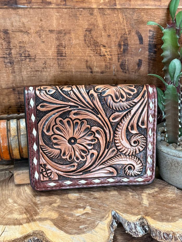 Brown tooled leather wallet with large floral panel, decorative stitching and border