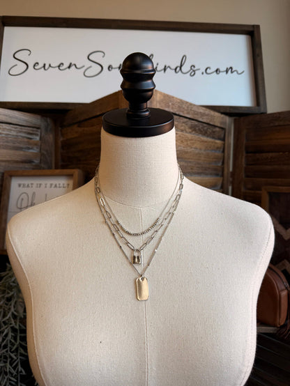 Triple-layer silver lock charm necklace, three chains with lock and plate pendants