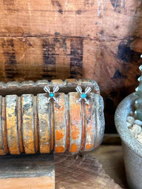 Silver arrow stud earrings with turquoise center stones