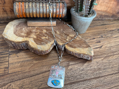 Silver chain roper necklace with rectangular turquoise world-map charm and dangling tag
