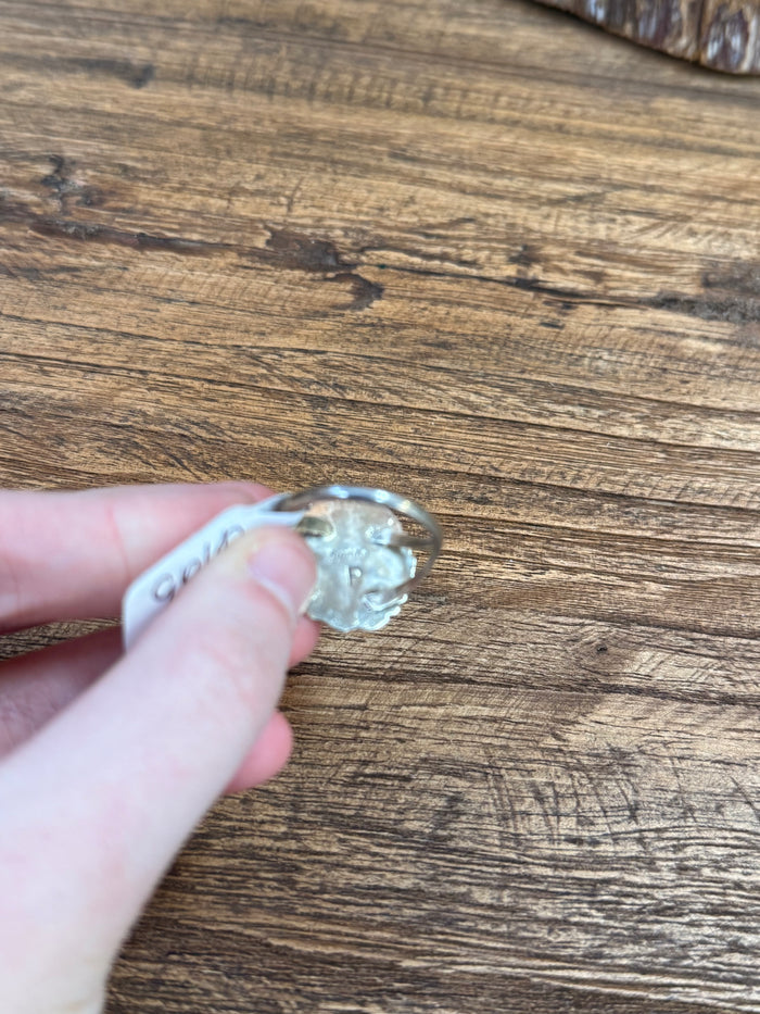 Sterling silver ring band close-up with engraved marks