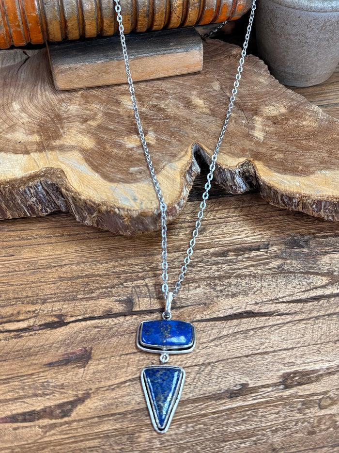 Blue lapis charms lariat necklace with silver chain and rectangular top charm