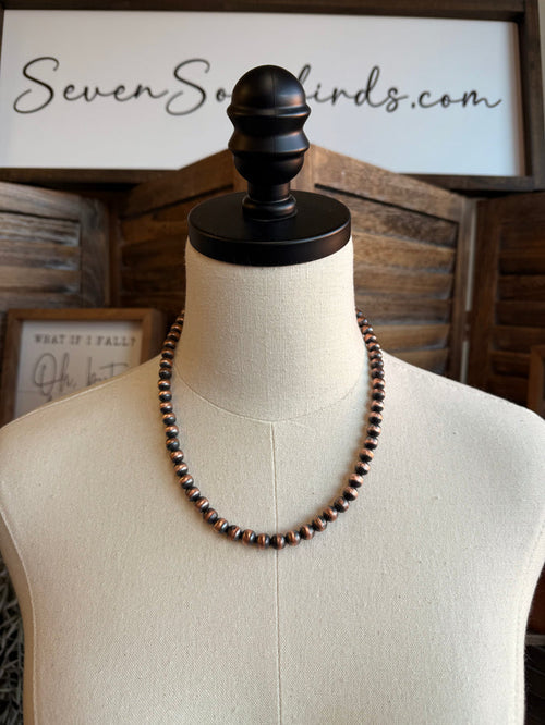 18-inch copper bead necklace on mannequin