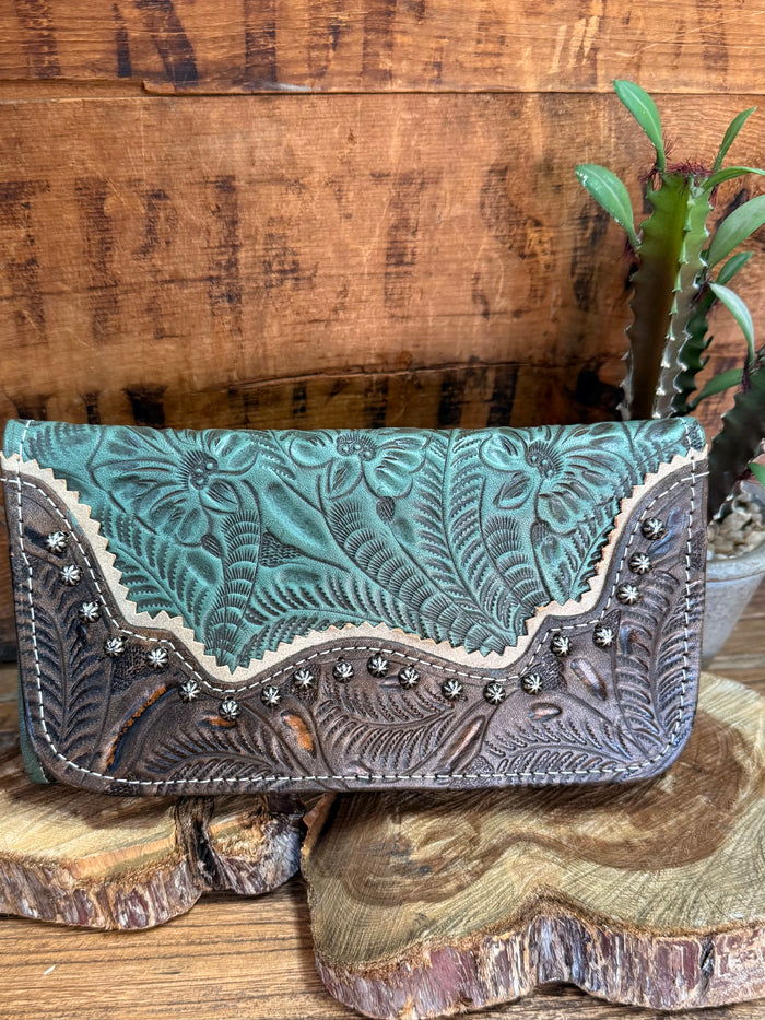 Turquoise leather hand-tooled wallet with ornate border stitching and silver-tone studs