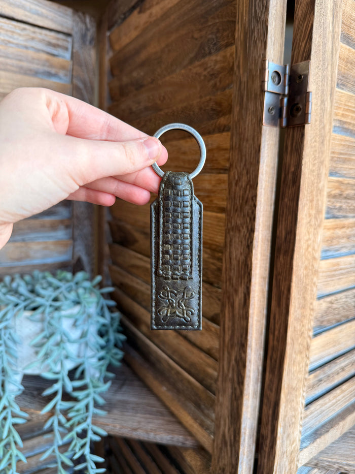 Olive braided leather keychain with ring, embossed rectangle and decorative border