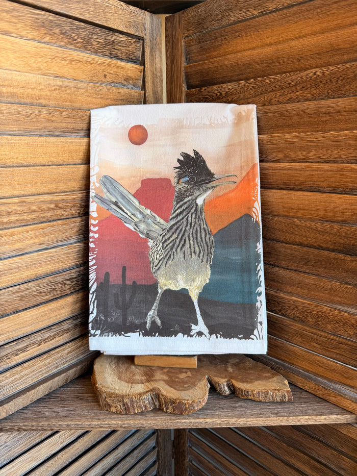 Watercolor tea towel with road runner, orange sun, and desert skyline illustration