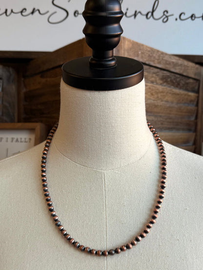 Copper bead necklace front view on mannequin, smooth bead chain