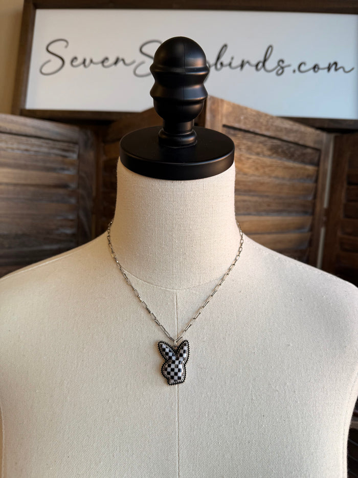 Silver chain necklace with checkered bunny pendant, black and white enamel