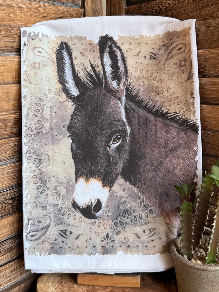 Donkey watercolor tea towel with close-up gray donkey head, tan background, decorative motifs