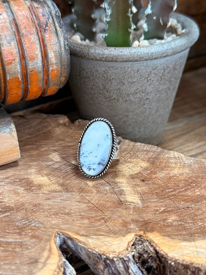 Adjustable silver-tone ring with oval light-blue dendritic opal and engraved border