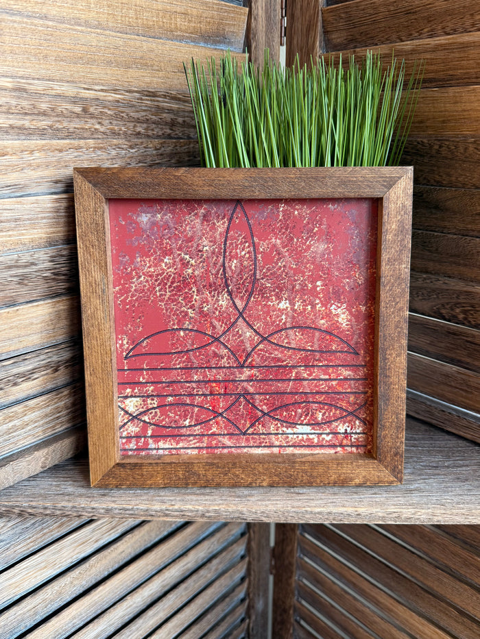 Rustic wood framed red abstract wall art with curving lines and speckled texture
