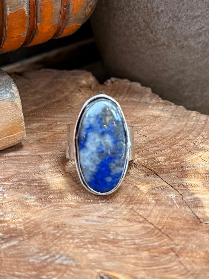 Silver-plated adjustable ring with oval blue lapis stone close-up