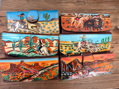 Set of hand-painted leather crossbody wallets with western desert animal scenes