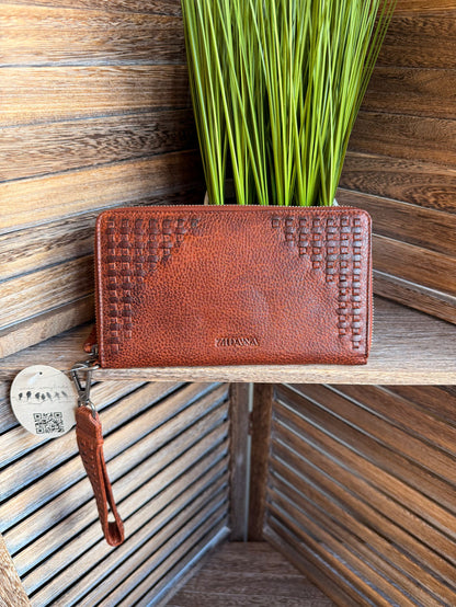Rusty brown leather wristlet wallet with zipper, textured finish, and wrist strap