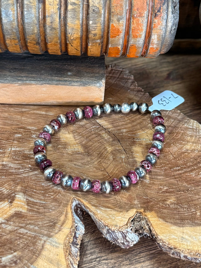 Stretchy purple and silver beaded bracelet with spiny oyster-style beads and pearl accents