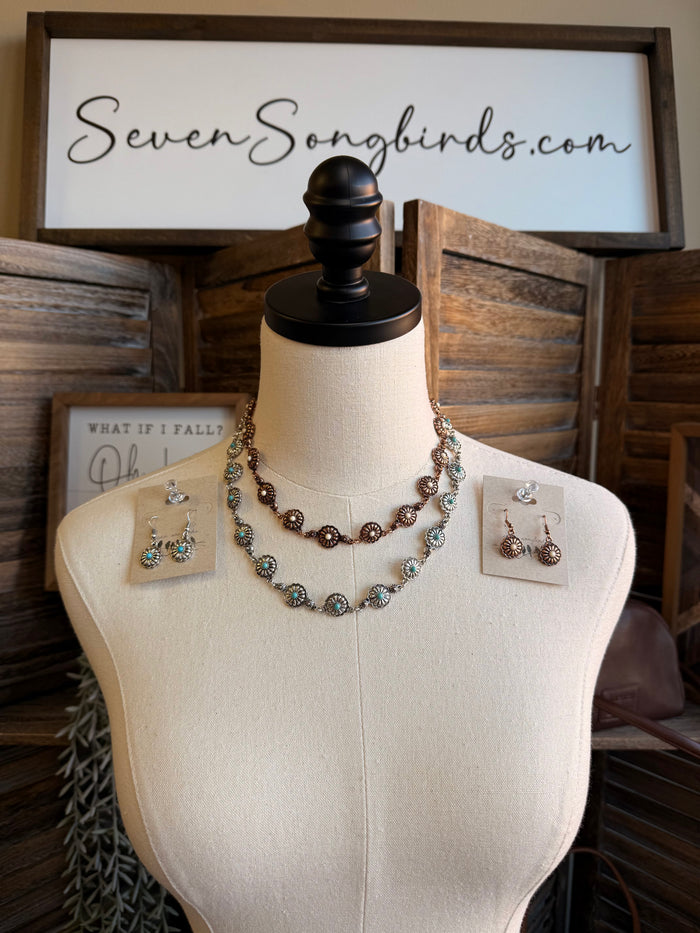 Copper-toned concho necklace and stud earrings with turquoise stone accents