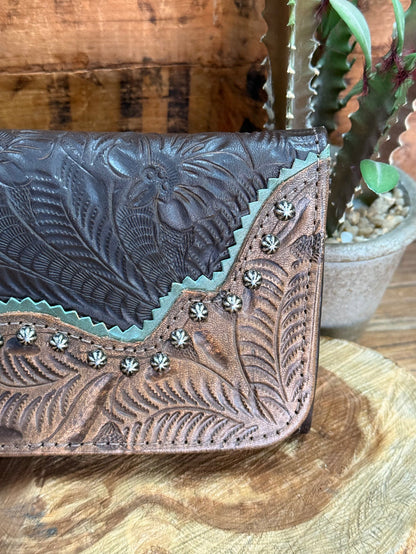 Embossed floral leather wallet with silver-toned studs and decorative side panel