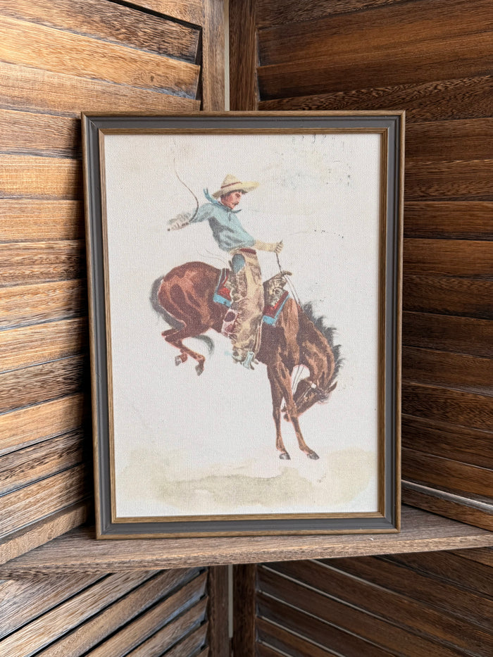 Framed cowboy on bucking bronco wall art, 11x15, dark wood frame