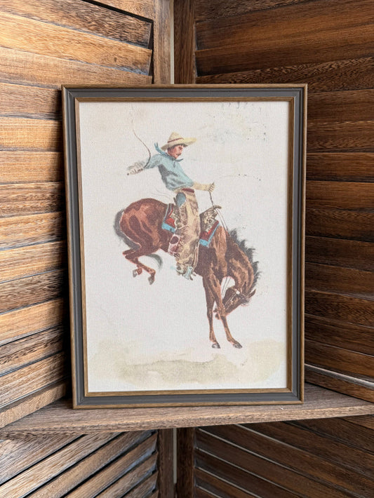 Framed cowboy on bucking bronco wall art, 11x15, dark wood frame