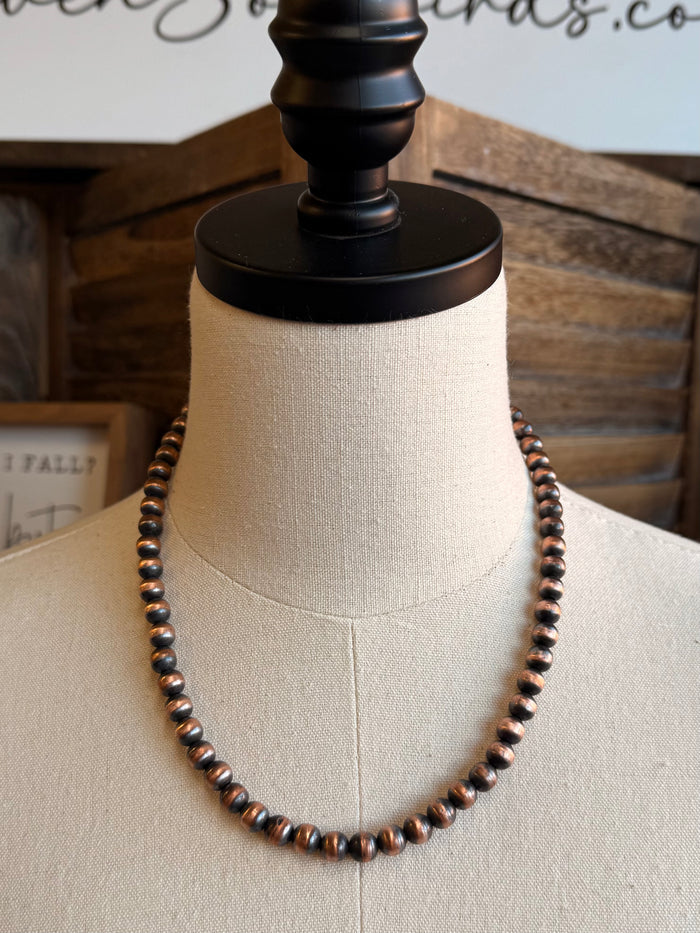 18-inch copper bead necklace, front view on mannequin