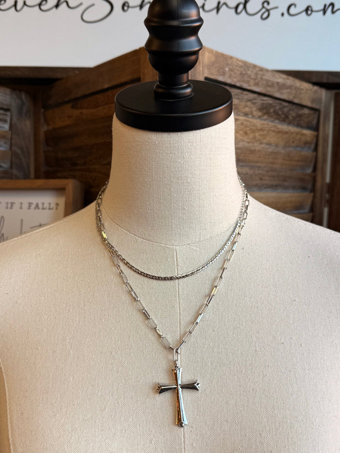 Silver-tone chain necklace with cross pendant and extended chain links