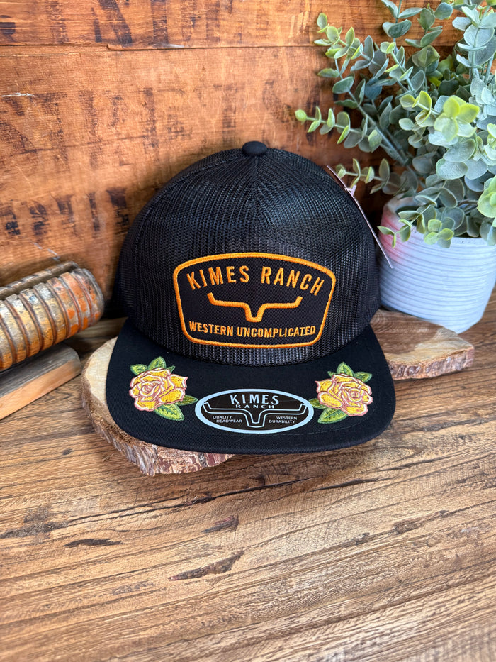 Black mesh baseball cap with embroidered Kimes Ranch patch and rose graphics