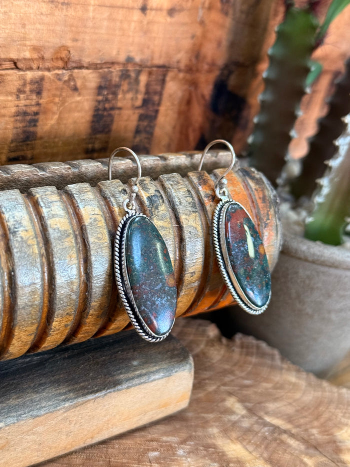 Oval red-blue stone fishhook earrings with silver-tone rope-edge bezel