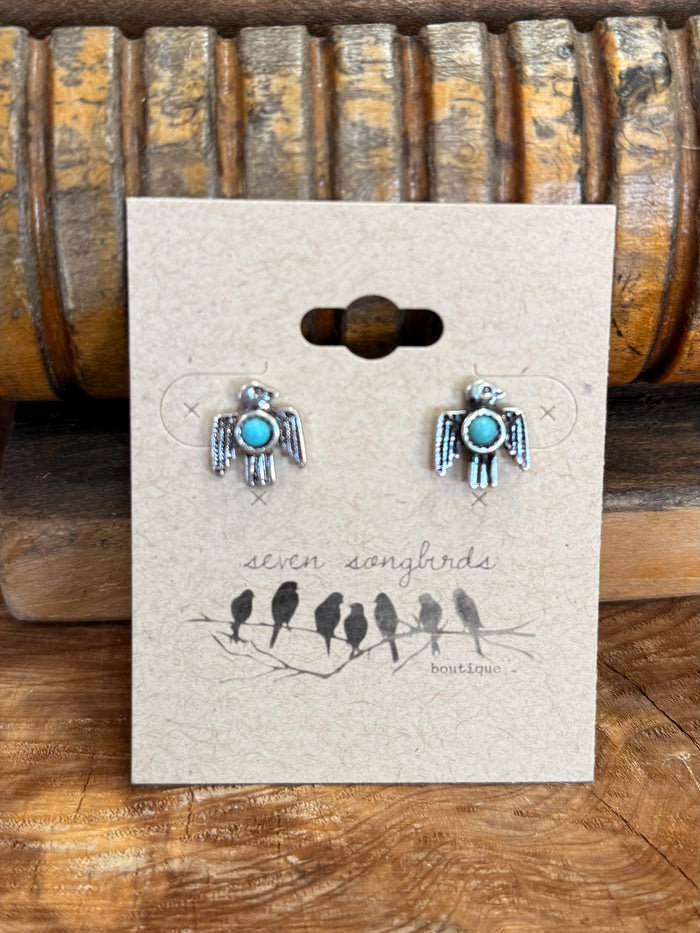 Turquoise thunderbird stud earrings in silver, round turquoise center and textured edges