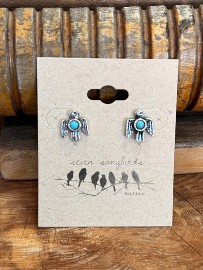 Turquoise thunderbird stud earrings in silver, round turquoise center and textured edges