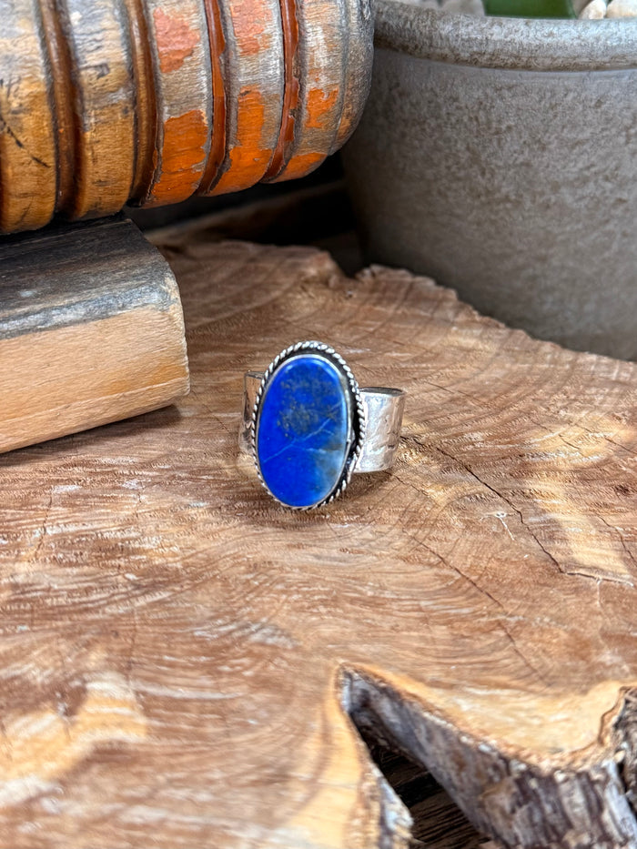 Adjustable silver-plated ring with oval blue lapis stone bezel