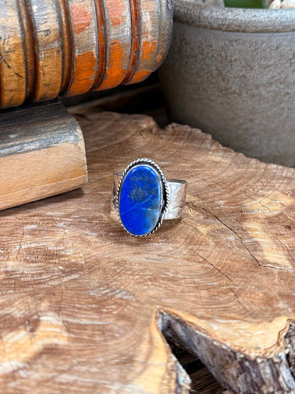 Adjustable silver-plated ring with oval blue lapis stone bezel