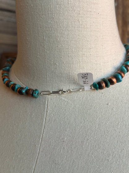 Copper and turquoise bead necklace clasp and extender on a display bust