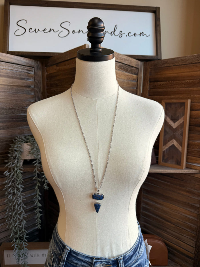 Blue stone lariat necklace with oval top charm and teardrop dangle on chain