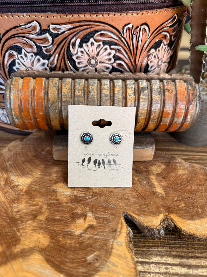 Silver concho stud earrings with turquoise cabochon centers, round silver frames