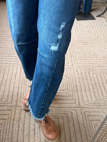 Mica barrel jeans in dark blue wash, frayed ankle hem with knee rip and distressed finish