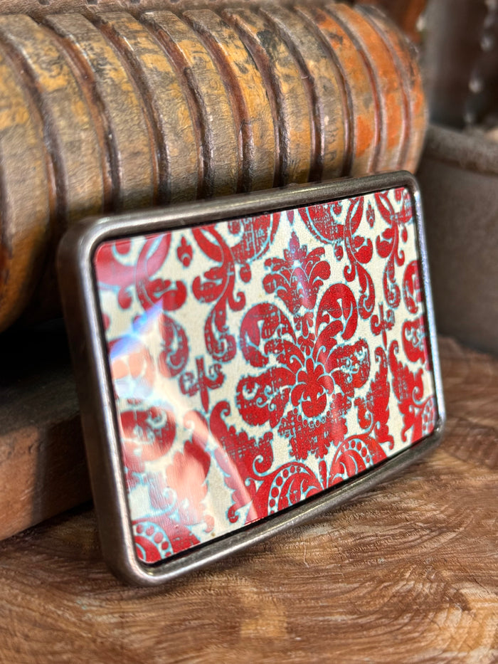 Red damask belt buckle with silver frame and glossy red floral pattern