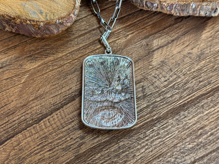 Silver roper necklace with rectangular textured pendant and chain links